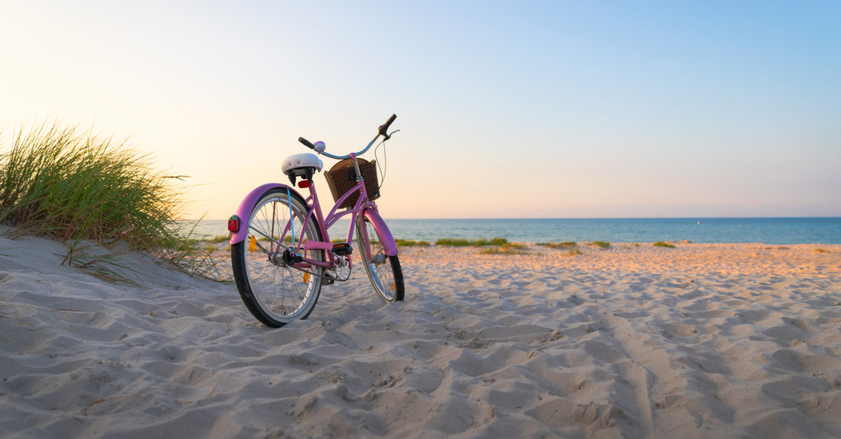 Bike at Baltic sea beach and sand dunes
